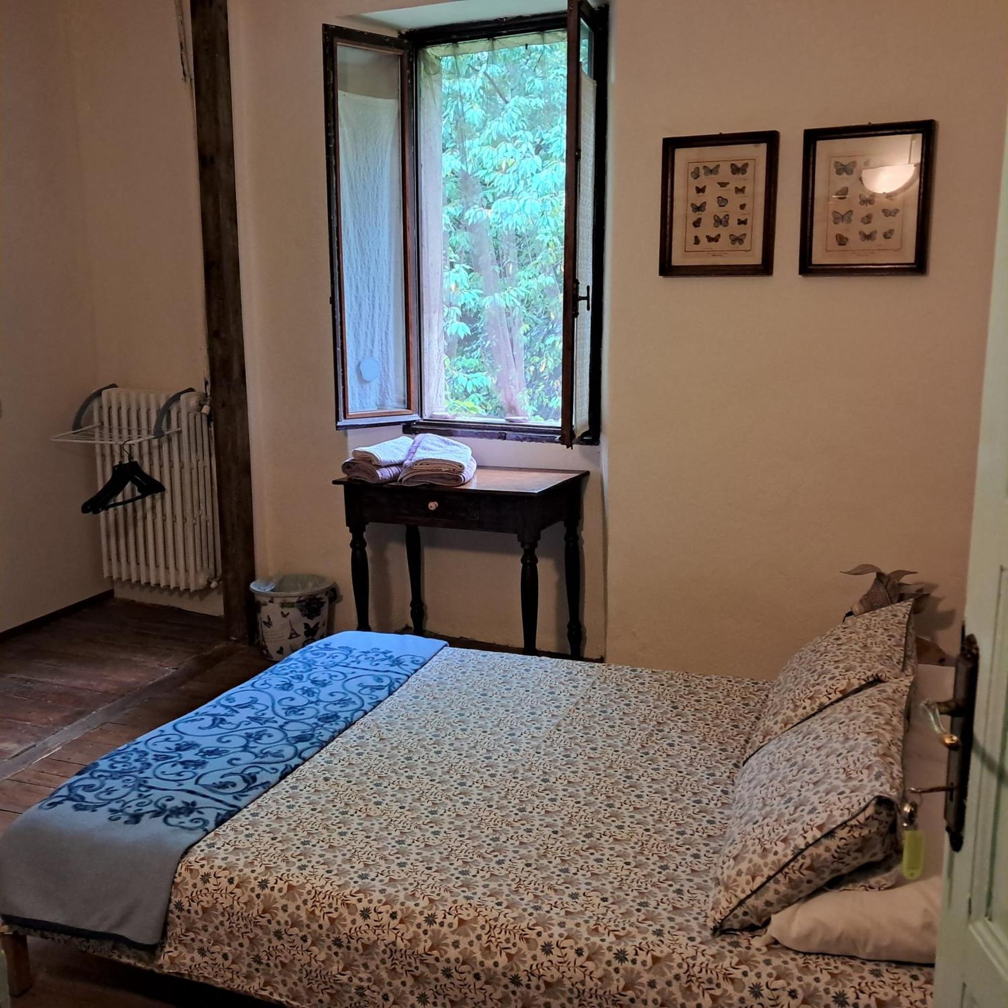 La Stanza Del Bosco Appartement Arcumeggia Buitenkant foto
